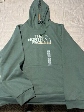 The North Face Men's Hoodie in Deep Green with White Logo